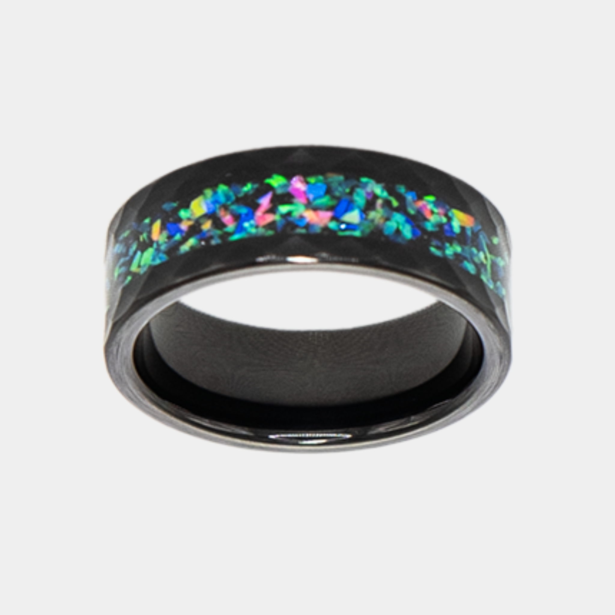 Aeolus ring – Hammered Black Tungsten, Crushed Opal Inlay from the Hustler Collection. Top-down view showcasing ring face.