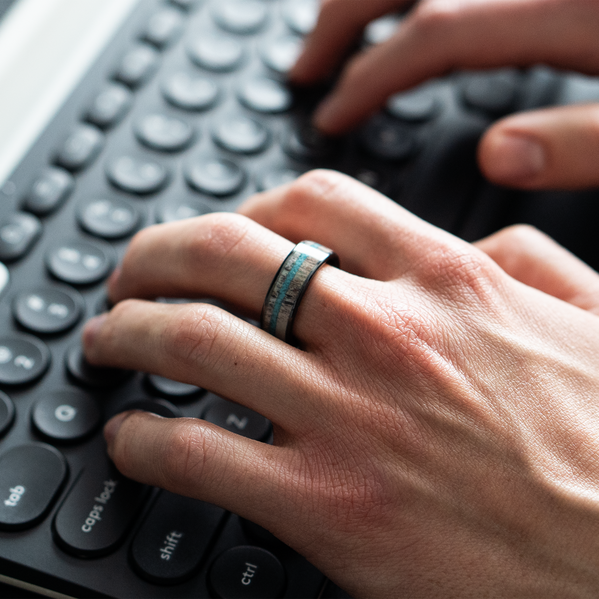 Hermes ring – Polished Black Ceramic with Turquoise and Deer Antler Inlays from the Hustler Collection. Lifestyle Shot - On Hand