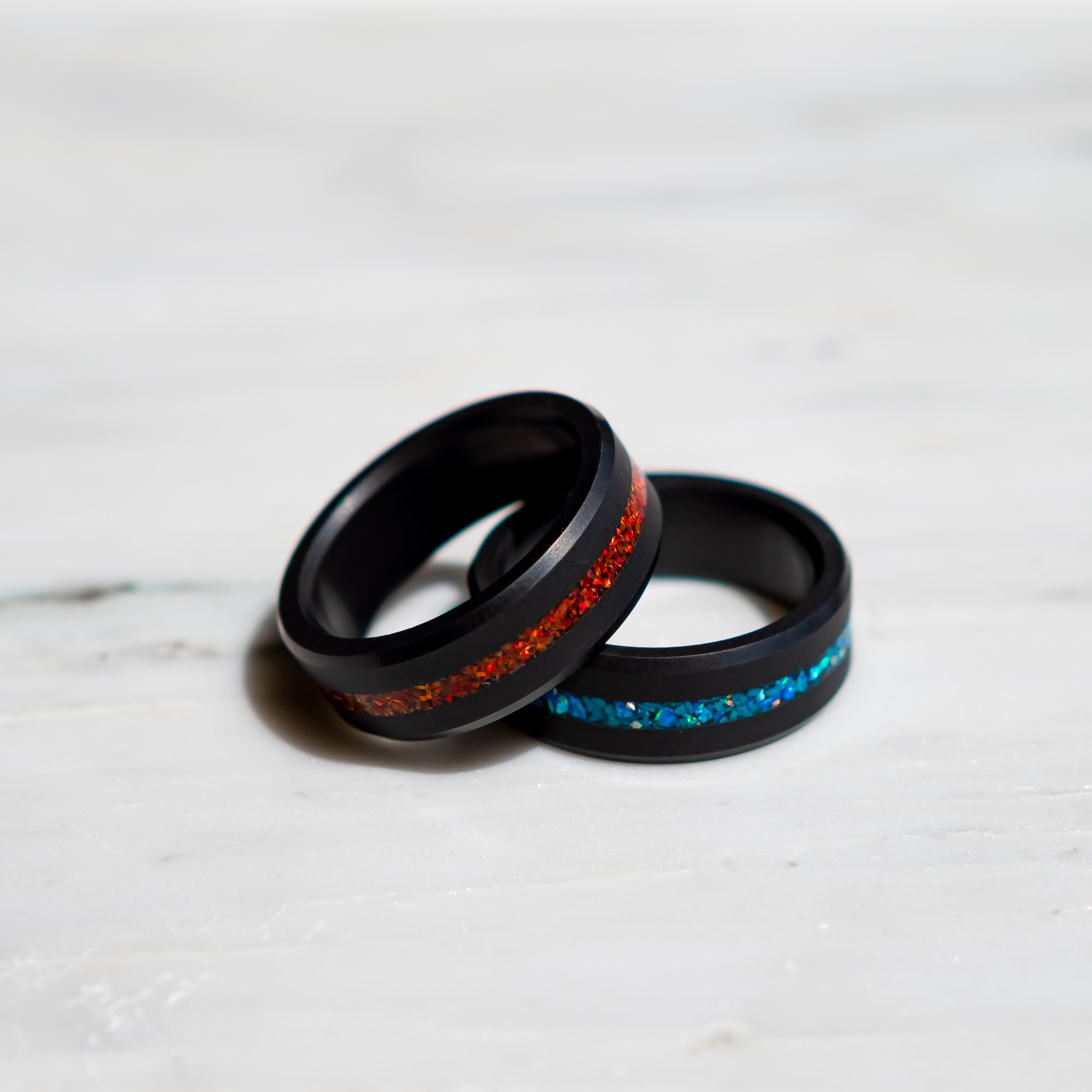 Ring shot of our Elysium ARES Men's Black Diamond & Red Opal ring & Blue Opal Ring | ElysiumBlack.com | Men’s Opal Rings | Opal Rings for Men